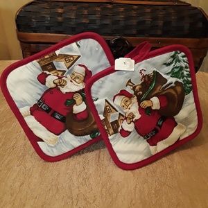 Pair of Santa Delivering Gifts Potholders